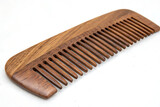 brown wooden comb for hair AI generated by PNG