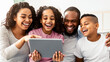 © Prostock-studio - Free Time Together. Portrait of positive black parents and children digital tablet together at home, watching family photos or funny comedy video online, people laughing sitting on sofa in living room