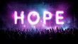 © buraratn - Vibrant concert scene with large illuminated sign spelling HOPE in bright pink lights, surrounded by enthusiastic crowd raising their hands in celebration and unity