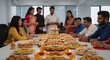 © Rima Akter - Indian colleagues celebrate diwali festival with festive treats and decorations at the office