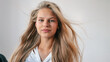 © shine.graphics - Confident young woman with long blonde hair and natural makeup looking at camera, wearing white blouse, fresh beauty and lifestyle portrait with dynamic hair
