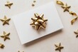 © AVR - A luxury gift card complete with a metallic gold ribbon bow for a sophisticated retail display