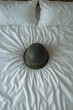 © Aleksandra - Soldier's helmet on an empty bed - waiting for a return that never comes