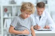 © Simon - Young caucasian boy with stomach ache visiting doctor in medical office
