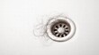 © FrameShift - Hair clogs the bathroom sink drain, creating a common plumbing problem in the home.