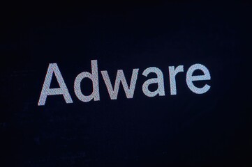 malicious software highlighted on a monitor surrounded by binary digits in a tilted view with a retr