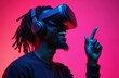 © Vadym - Joyful African American man wears VR headset, immersed in virtual reality experiencing excitement. Laughs, points finger. Modern tech, gaming, entertainment, futuristic lifestyle, trendy, energetic,
