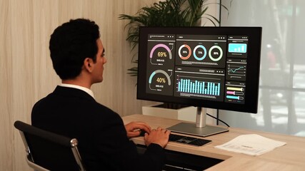 Man, programmer coding hologram at night doing data analytics, information technology malware or software . Male person, coder or developer working late in computer display in problem solving.