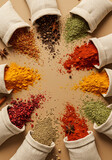 Colorful spice bags on beige background.