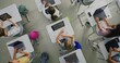 © Framestock - Primary School Students Working on Creative Projects on Laptops, Practicing Digital Skills in Art Class. Young Kids Drawing, Creating Pictures on Digital Devices. Interactive STEM Learning. Top View.