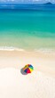 © lisa - Colorful umbrella on a pristine beach