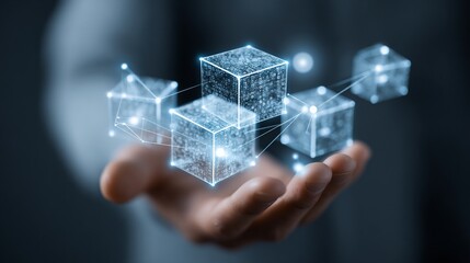 Human hand supporting interconnected digital cubes on a dark backdrop