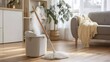 © Natalia S. - A modern steam mop releases visible vapor while cleaning a wooden floor in a bright living room with natural light. The household concept emphasizes hygiene, freshness, and efficient cleaning tools