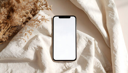 Smartphone placed on fabric background