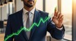 © Meow Creations - Businessman touching a glowing green growth chart, symbolizing financial success and future investment