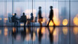 © Weiguo - Long exposure shot of crowd of business people walking in bright office lobby fast moving with blurry,