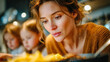 © Aliaksandra - Thoughtful mother with children blurred in background during meal preparation
