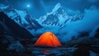 © MABRUR - Orange tent nestled at base of snow-capped mountains at night