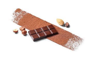 Wall Mural - composition with tasty chocolate, cocoa powder and nuts on light background