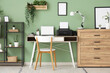 © Pixel-Shot - Workplace with modern printer, laptop and desk lamp in stylish home office