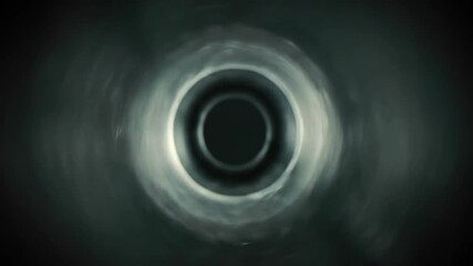 Metal hole, metallic object with circular design against dark background