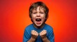 © MotherPray - Angry boy shouts red background studio portrait