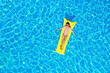 © New Africa - Girl on inflatable mattress in swimming pool, top view. Summer vacation