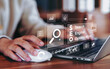 © Katawaredoki - Businesswoman using a laptop for analysis SEO icon to analyze search engine optimization for marketing and online traffic on website performance improvement rankings with strategic digital techniques