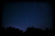 © romantiche - night landscape: view on dark blue starry sky above trees