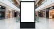 © Gra-fix PNG - Blank white screen digital advertising kiosk in a blurred shopping mall interior digital display blank screen