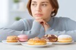 © Luiri Art - Young woman in light sweater sitting at a table with various desserts, looking away thoughtfully, soft indoor light, symbolizing emotional eating, food temptation and self-control