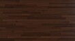 © Winteronlen - Closeup of dark brown hardwood floorboards arranged horizontally in a staggered pattern
