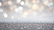 © MS - Abstract close-up of shiny silver glitter. A festive and bright silver glittery backdrop.
