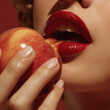 © weart2studio - close up of woman eating a peach fruit