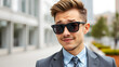 © Frank - portrait of funny skeptic young businessman in sunglasses