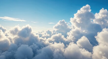 Wall Mural - Heavenly Clouds: A mesmerizing capture of a vast sky adorned with fluffy, ethereal clouds. The boundless expanse of blue seamlessly blends with the white, creating a sense of tranquility.