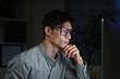 © Stella 16 - Businessman working overtime at his desk late at night