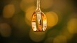 © li - Golden wedding rings hanging gracefully, symbolizing love and commitment with a soft background.