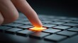 © Nitchalee N. - Cloud based access control, A close-up of a finger pressing a glowing key on a sleek keyboard, illustrating the interaction between technology and human touch.