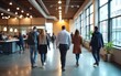 © wang - Group of business people walking at modern open space. Team of business employees at coworking center. Motion blur. Concept work in process. High quality