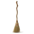 © wannn - Rustic Broom with Wooden Handle and Straw Bristles for Home Decor.