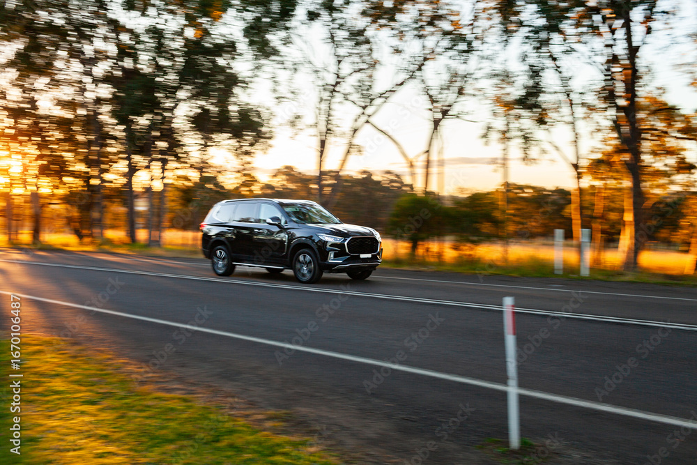Movement of car travelling past in rural country setting in Australia ...