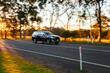© Austockphoto - Movement of car travelling past in rural country setting in Australia