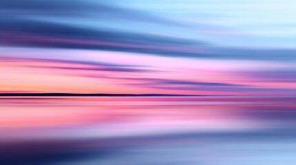 Wall Mural - Serene sunset over calm waters, with vibrant pink and blue hues reflecting in the tranquil lake