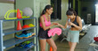 © Raushan_films - Indian young adult gen z lady wear sports clothe hold towel wipe off sweat take break after gym warm up teen girl meet friend talk about health care enjoy day spend time have fun joy room place