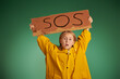 © Andrey Kiselev - SOS Sign child