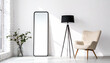 © Pixelcraze - Large standing floor mirror beside modern chair in bright white room