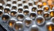 © Ygor - A close up view of a grid of silver spheres with light reflecting off of them and a checkered background
