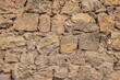 © Emily_M_Wilson - Patterns in a rough stone and mud wall.