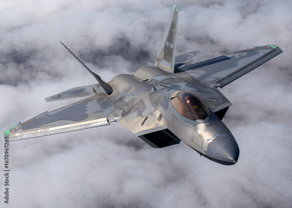 F 22 Rator In Flight Photos Extremely close view of a a F-22 Raptor flying over clouds Stock Photo ...